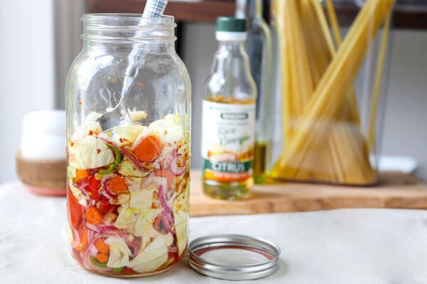 Spicy Pickled Vegetables - These spicy pickled vegetables are the perfect addition to salads and sandwiches. They are low in fat and calories and will make your next meal pop with bright flavors! Recipe, vegetarian, pickles, snack, gluten free, side | pickledplum.com