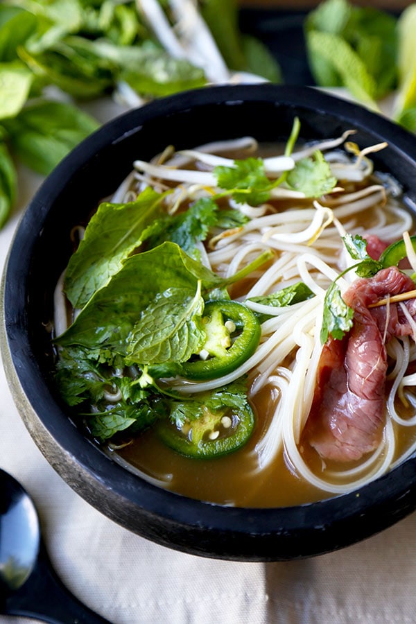 Easy Pho Soup - Slurp your noodles with abandon in 30 minutes with this Easy Pho Soup Recipe! A quick, satisfying and full-flavor version of Vietnam’s national dish. Recipe, soup, Vietnamese food, noodle soup, healthy, pho soup | pickledplum.com