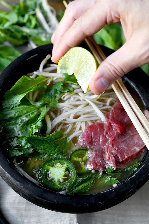 Easy Pho Soup - Slurp your noodles with abandon in 30 minutes with this Easy Pho Soup Recipe! A quick, satisfying and full-flavor version of Vietnam’s national dish. Recipe, soup, Vietnamese food, noodle soup, healthy, pho soup | pickledplum.com