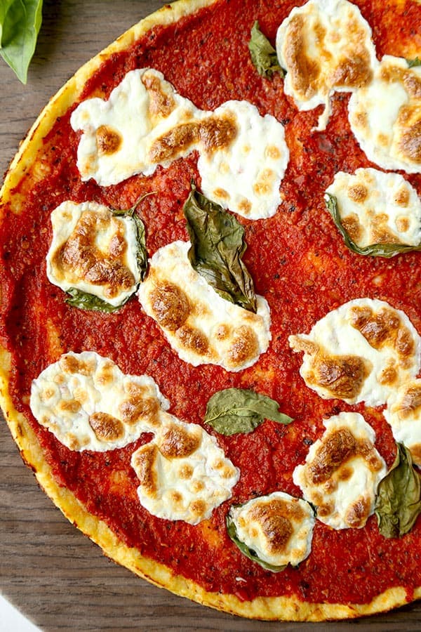 Gluten Free Cauliflower Pizza Crust Alla Margherita - A delicious Cauliflower Pizza Crust Alla Margherita Recipe that tastes just like a pizza-pie from your favorite pizzeria. Gluten Free and ready in 35 minutes! Recipe, gluten free, snack, pizza, healthy, Super Bowl | pickledplum.com