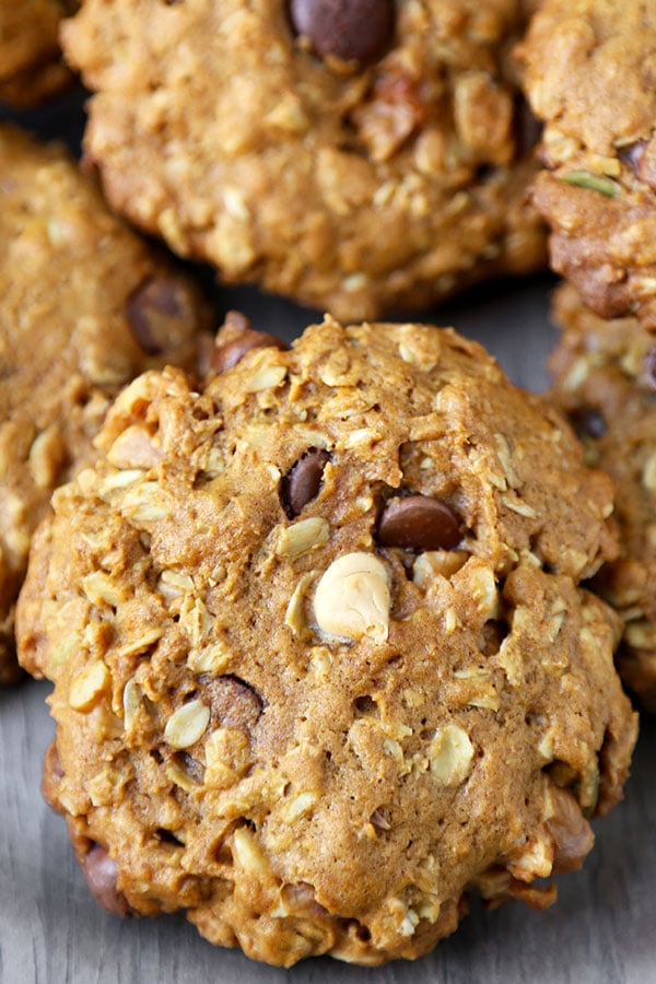 Pumpkin Oatmeal Cookies - These healthier Pumpkin Oatmeal Cookies are one part gooey oatmeal chocolate chip cookie, one part pumpkin pie. Ready in 25 minutes from start to finish! Recipe, cookies, dessert, healthy snack, baking | pickledplum.com