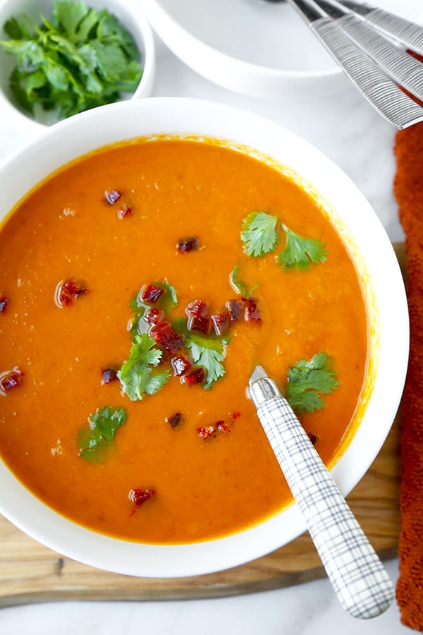 Sweet Potato Chorizo Soup - Loaded with fall vegetables, this smoky Sweet Potato Chorizo Soup Recipe celebrates the changing seasons. Sweet potato soup never tasted so good! Recipe, healthy, soup, appetizer, dinner | pickledplum.com