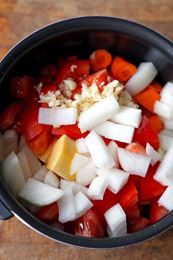 Slow Cooker Autumn Vegetable Soup - This is a healthy vegetarian recipe for the best slow cooker vegetable soup. Low carb, vegan and gluten free, this soup is packed with veggies and beans and tastes both sweet (from tomatoes) and savory. Ideal for weight loss, diets and weight watchers whole 30! #whole30 #vegansoup #veganrecipes # healthyeating | pickledplum.com