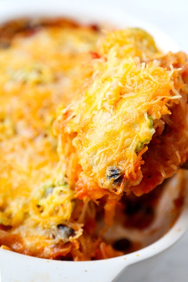 Mexican Spaghetti Squash Casserole - With the colors of autumn and peppy, south-of-the-border flavor, this Mexican Spaghetti Squash Casserole With Avocado Salsa Recipe is healthy dinner perfection! Recipe, healthy, dinner, main, casserole | pickledplum.com