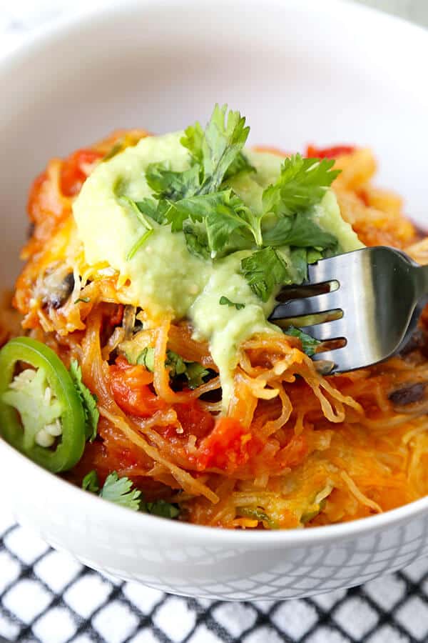 Mexican Spaghetti Squash Casserole - With the colors of autumn and peppy, south-of-the-border flavor, this Mexican Spaghetti Squash Casserole With Avocado Salsa Recipe is healthy dinner perfection! Recipe, healthy, dinner, main, casserole | pickledplum.com