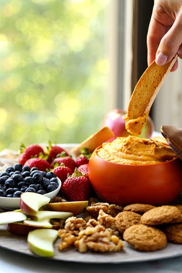 Pumpkin Dip Recipe - Low fat ricotta, mascarpone, pumpkin puree and fall spices make a whipped Sweet Pumpkin Dip Recipe that will be your healthier go-to dessert recipe this holiday season! Recipe, dip, pumpkin, snack, Thanksgiving, Christmas, healthy snack | pickledplum.com