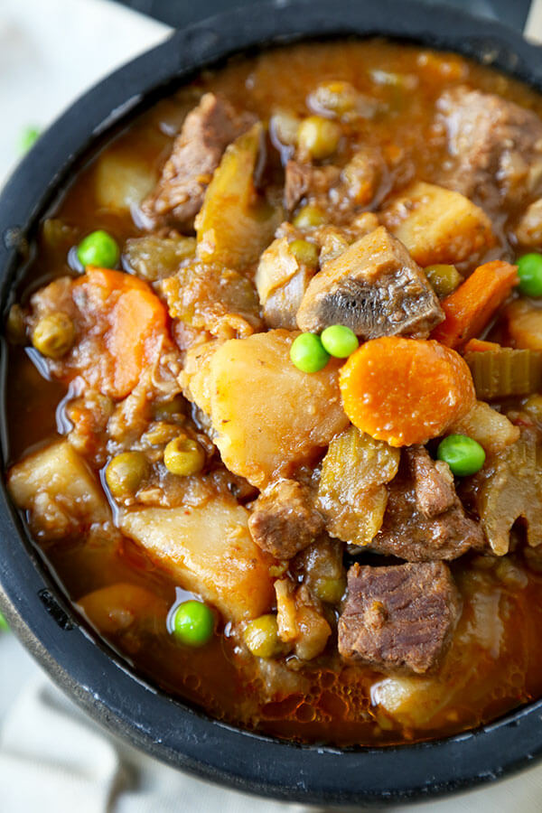 Slow Cooker Beef Stew - Comfort food deliciousness! Savory and warming Slow Cooker Beef Stew Recipe. 10 minutes of kitchen prep is all this satisfying beef stew recipe requires! Recipe, beef, meat, slow cooker, crock pot, dinner, hearty, soup, goulash | pickledplum.com