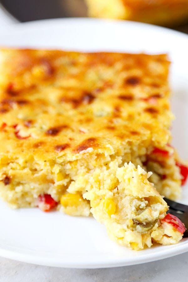 Lightened Up Corn Casserole - This Lightened Up Corn Casserole Recipe has the spirit of cornbread with the soul of a creamy autumn casserole. Ready in 40 minutes from start to finish! Recipe, Thanksgiving, Christmas, corn, side dish, baking | pickledplum.com