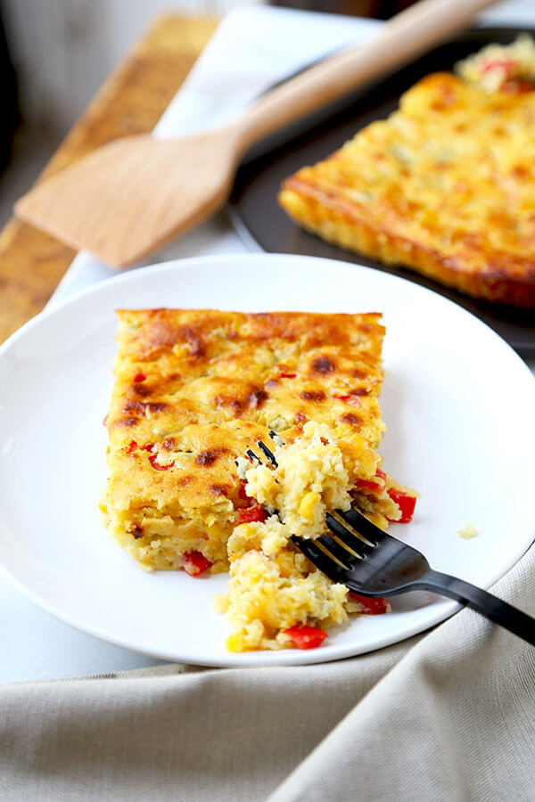 Lightened Up Corn Casserole - This Lightened Up Corn Casserole Recipe has the spirit of cornbread with the soul of a creamy autumn casserole. Ready in 40 minutes from start to finish! Recipe, Thanksgiving, Christmas, corn, side dish, baking | pickledplum.com
