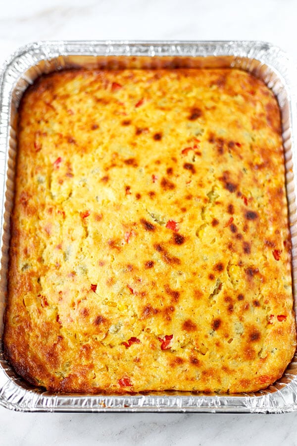 Lightened Up Corn Casserole - This Lightened Up Corn Casserole Recipe has the spirit of cornbread with the soul of a creamy autumn casserole. Ready in 40 minutes from start to finish! Recipe, Thanksgiving, Christmas, corn, side dish, baking | pickledplum.com