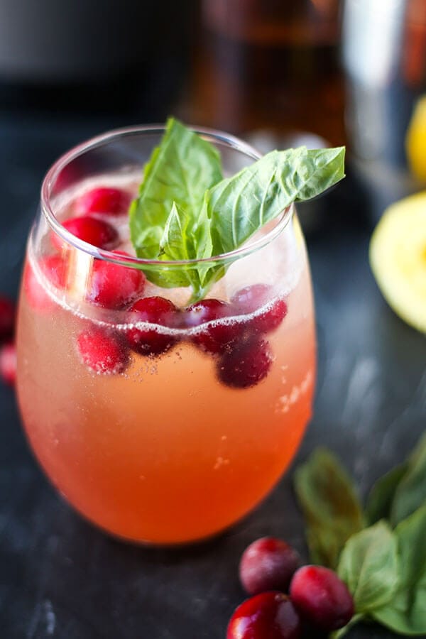 Kentucky Buck - This is the perfect winter/fall holiday fruity cocktail that's both tart and sweet! You can enjoy this Kentucky buck by a roaring fire or serve it for a crowd in a pitcher during Thanksgiving or any day of the year! #whiskey #fruitycocktail #thanksgivingrecipe #libations | pickledplum.com