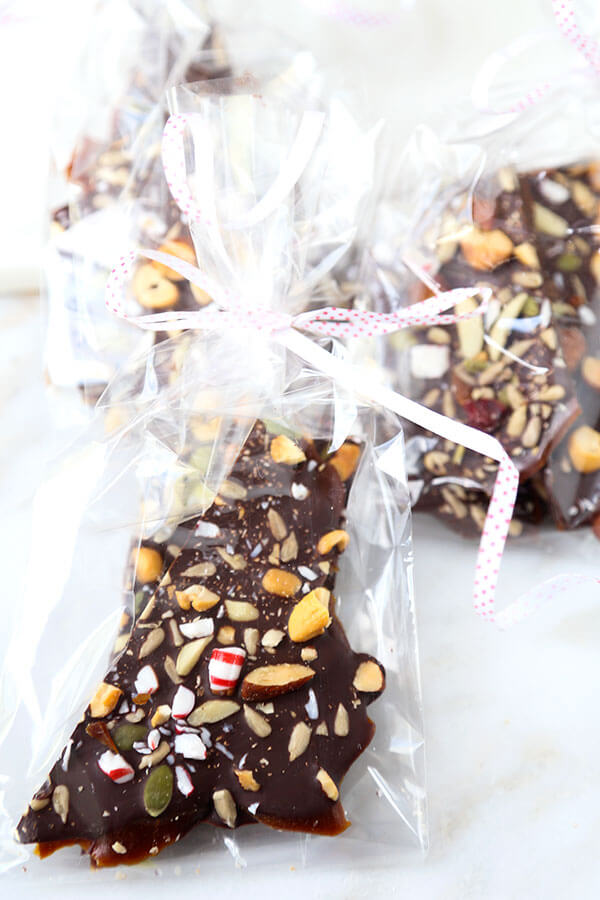 Super Nutty Chocolate Peppermint Bark - One layer of naughty and two layers of nice make this Super Nutty Chocolate Bark the perfect sweet, holiday inspired treat. It also makes a great homemade gift! Recipe, Thanksgiving, Christmas, toffee, dessert, snack, chocolate | pickledplum.com