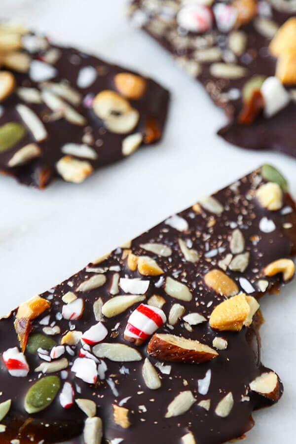 Super Nutty Chocolate Peppermint Bark - One layer of naughty and two layers of nice make this Super Nutty Chocolate Bark the perfect sweet, holiday inspired treat. It also makes a great homemade gift! Recipe, Thanksgiving, Christmas, toffee, dessert, snack, chocolate | pickledplum.com