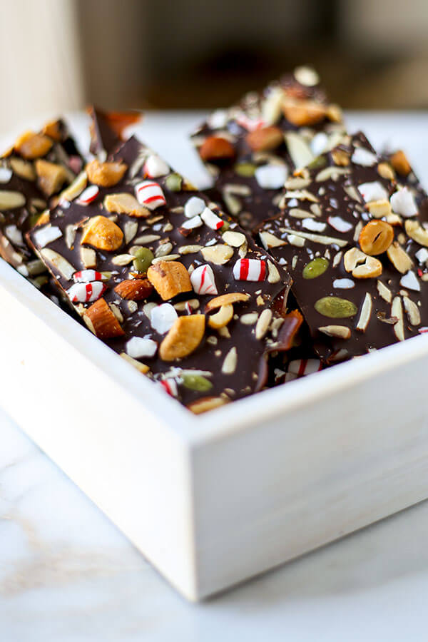 Super Nutty Chocolate Peppermint Bark - One layer of naughty and two layers of nice make this Super Nutty Chocolate Bark the perfect sweet, holiday inspired treat. It also makes a great homemade gift! Recipe, Thanksgiving, Christmas, toffee, dessert, snack, chocolate | pickledplum.com