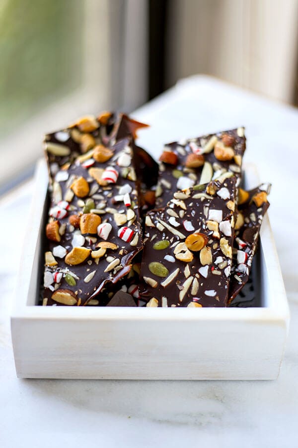 Super Nutty Chocolate Peppermint Bark - One layer of naughty and two layers of nice make this Super Nutty Chocolate Bark the perfect sweet, holiday inspired treat. It also makes a great homemade gift! Recipe, Thanksgiving, Christmas, toffee, dessert, snack, chocolate | pickledplum.com