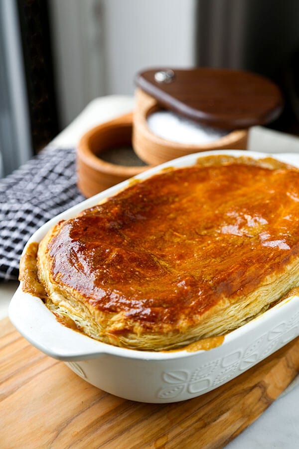 Hearty Vegetable Pot Pie - This hearty vegetable pot pie with creamy mushroom sauce and topped with puff pastry is guaranteed to keep you warm this winter! Recipe, dinner, vegetables, baking, pie | pickledplum.com