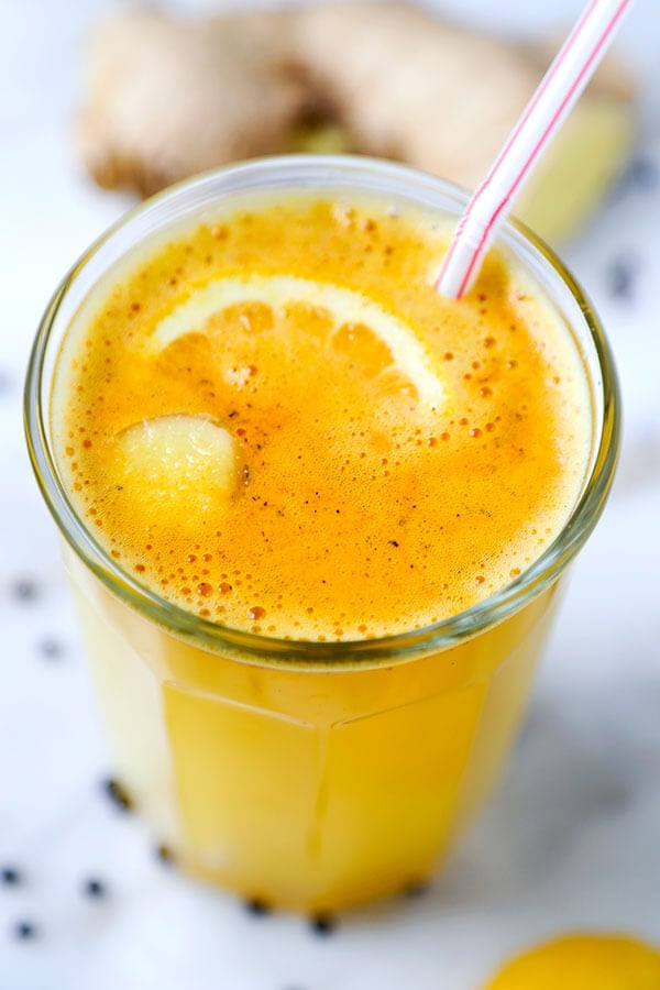 Morning Wellness Tonic - Add a little zing to your morning with this spicy, cleansing and invigorating wellness tonic! Recipe, drink, healthy, turmeric, ginger, breakfast | pickledplum.com