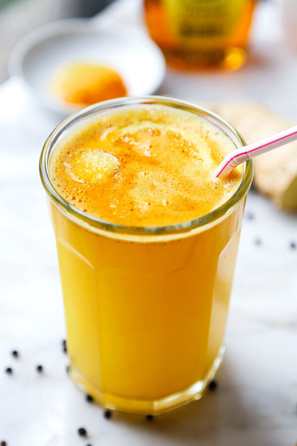 Morning Wellness Tonic - Add a little zing to your morning with this spicy, cleansing and invigorating wellness tonic! Recipe, drink, healthy, turmeric, ginger, breakfast | pickledplum.com