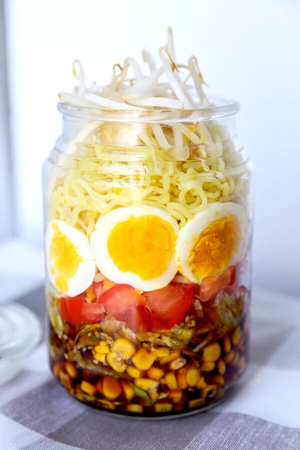 Ramen Noodle Salad - This a quick and delicious chilled ramen noodle salad tossed with fresh tomatoes, corn, lettuce, eggs and bean sprout and dressed in a sweet vinegar and sesame dressing. Recipe, ramen, vegetarian, healthy, salad, noodles, easy dinner recipes | pickledplum.com