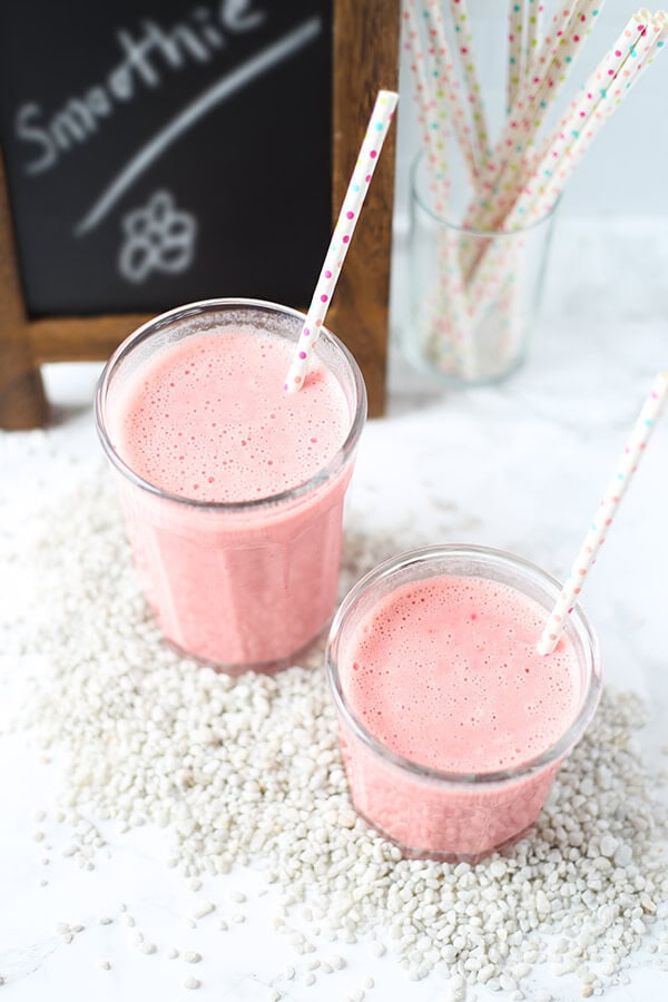 Strawberry Pineapple Coconut Smoothie - A morning pick me up with only three ingredients needed! This strawberry pineapple coconut smoothie is bright, refreshing and contains enough vitamin C to meet your daily RDA! Recipe, drink, smoothie, healthy, breakfast, fruits | pickledplum.com