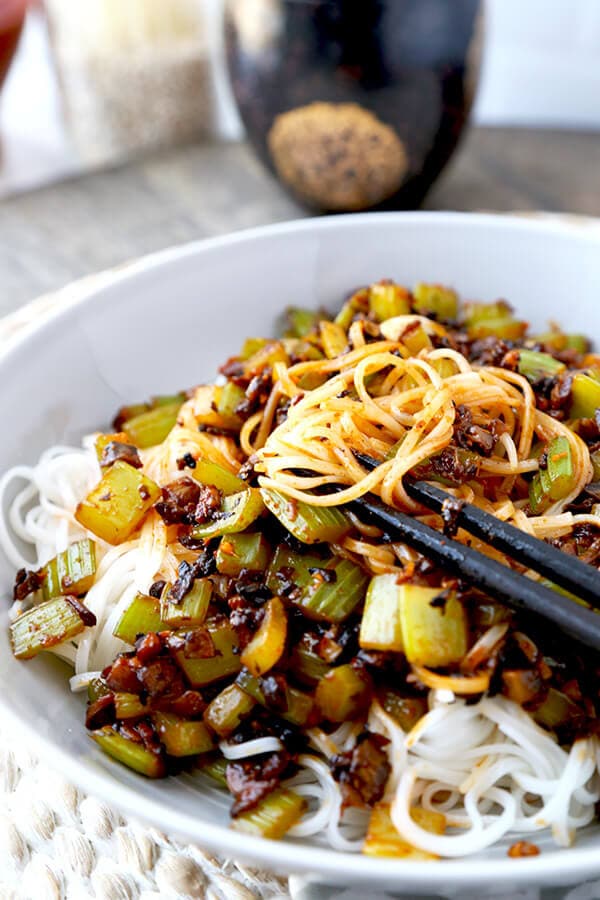 Spicy Vegan Sichuan Noodles - Smoky, spicy and with a punch of umami, these spicy vegan Sichuan noodles will keep you coming back for more. Plus, the entire recipe only requires 8 ingredients and is ready in 10 minutes! Easy recipe, vegan, vegetarian, Chinese food, noodles | pickledplum.com