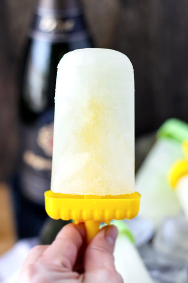 Lemon and Cava Popsicles - This is an easy recipe for light, sweet and tart popsicle that will give you a nice buzz all summer long! Recipe, dessert, ice pop, frozen treat, snack | pickledplum.com