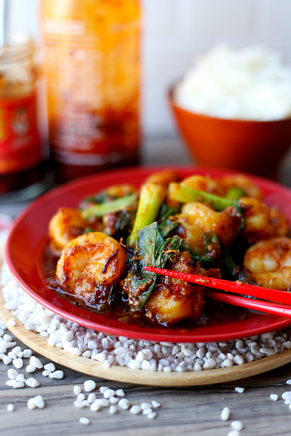 Garlic Shrimp With Chili Crisp - This garlic shrimp recipe is nothing like you've ever tasted before! We've the taken the classic recipe and turned it upside down to bring garlic shrimps that are smoky, salty, nutty and with just enough heat to make you reach for a spoonful of rice. It's insanely delicious! Recipe, shrimp, stir fry, Chinese food, easy recipe | pickledplum.com