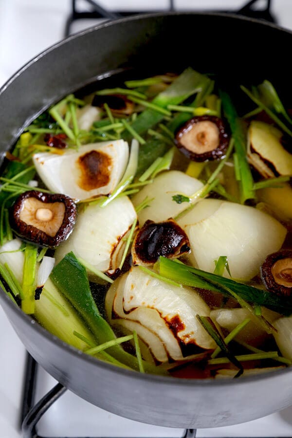 Vegetable Pho Broth - This is a mild yet fragrant vegetable pho broth recipe. Who says you need meat to make everything better? This vegan pho broth proves that veggies done well can taste spectacular! Recipe, vegan, vegetables, soup, pho, stock | pickledplum.com