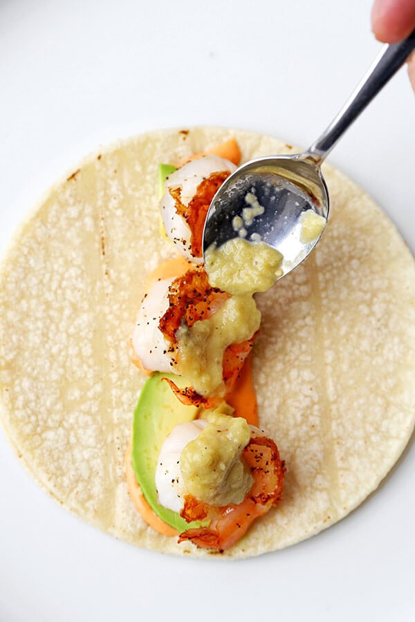 tomatillos-on-tacosShrimp Tacos with Tomatillo Sauce - Who knew it was this easy to make unforgettable shrimp tacos topped with colorful, refreshing and tasty toppings! Not only are these tacos healthy, they are addictive! Recipe, Mexican, tacos, seafood, healthy | pickledplum.com