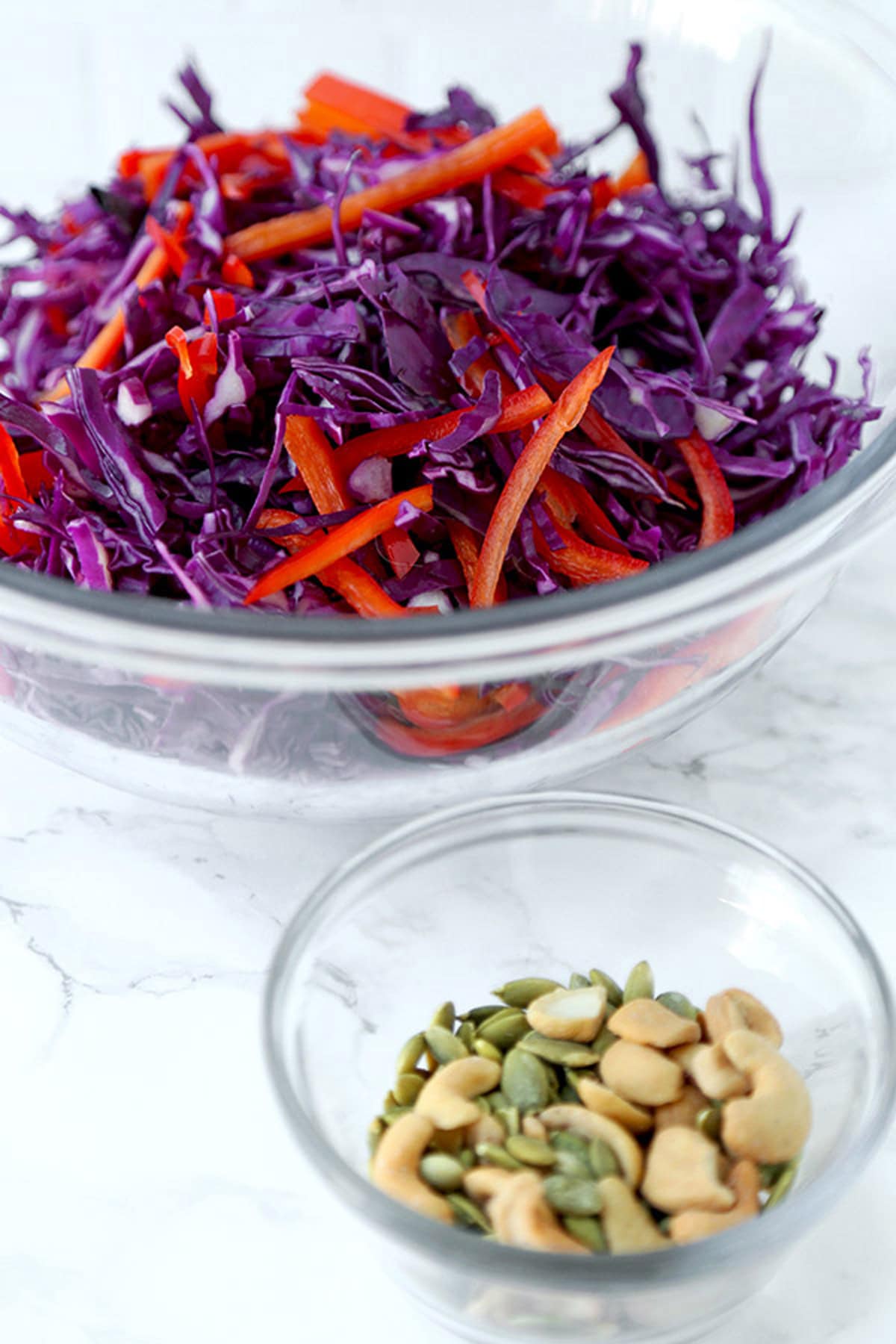 shredded red cabbage and pumpkin seeds