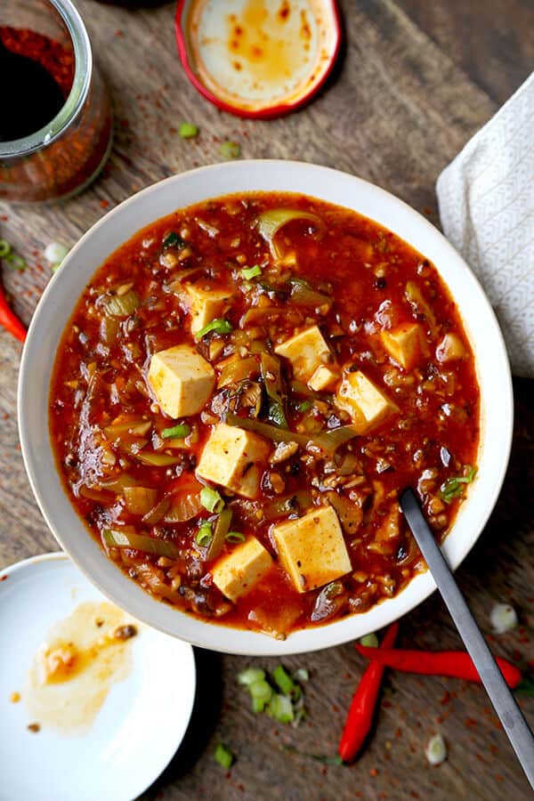 29 Tofu Recipes That Will Make You Rethink Meat! Tofu is such a versatile ingredient and something I have been cooking with since I was a kid. There is so much you can do with tofu and this post (for beginners and professionals) shows you it can be used in several different ways - Healthy, easy tofu recipes. Use it in a dessert, in a smoothie or in stir fries and main dishes. Marinated tofu, Vegan, for kids, Asian style, Western style. Recipes for silken, medium and firm tofu. #tofu #healthyeating | pickledplum.com 