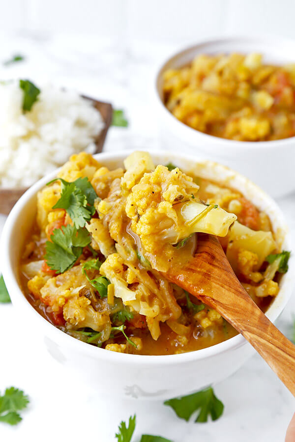 Thai Yellow Curry - Like it spicy? This pungent and fiery Thai Yellow Curry With Cauliflower is loaded with bold and authentic Southeast Asian flavors. vegetable curry recipe, plant based curry recipe, Thai dinner recipe, healthy cauliflower recipes | pickledplum.com