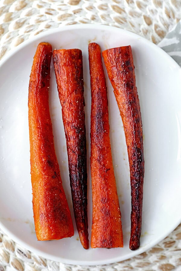 The Best Carrot Steaks - With a meaty bite and a caramelized exterior, these pan-fried carrot steaks can be the focal point of a delicious plant based dinner! vegan dinner recipes, meatless dinner recipe, healthy vegetable recipe, gluten free, vegetarian | pickledplum.com