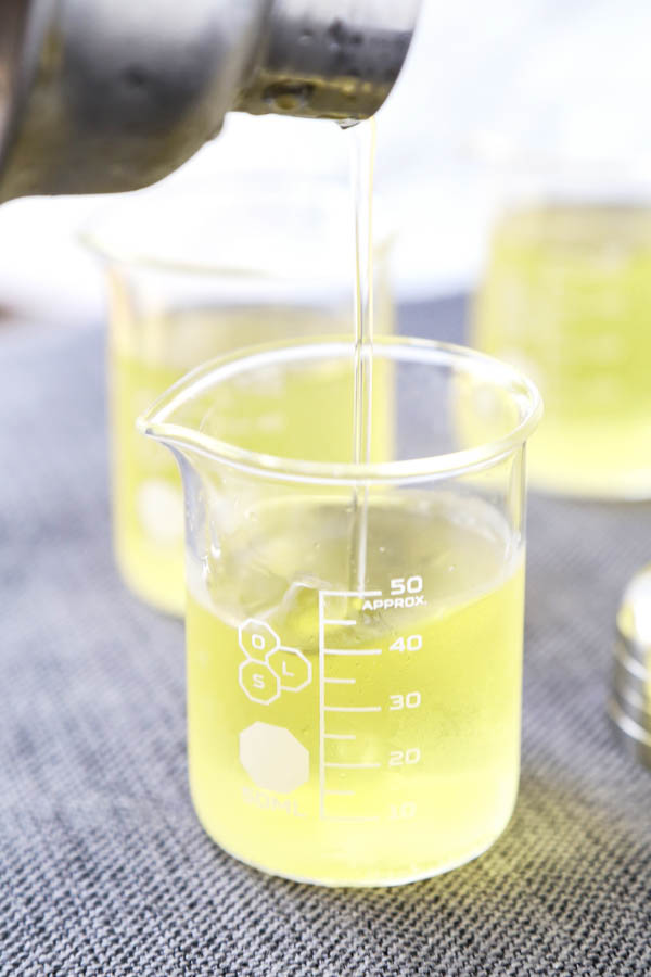 Green Tea Shot - This tasty cocktail gets its name from its kinda greenish color - no green tea is actually used in this shot recipe. What you get are bright and soothing peachy flavors. Cocktail recipes, shots alcohol, shot recipes, alcoholic drinks for a party, alcohol and spirits | pickledplum.com