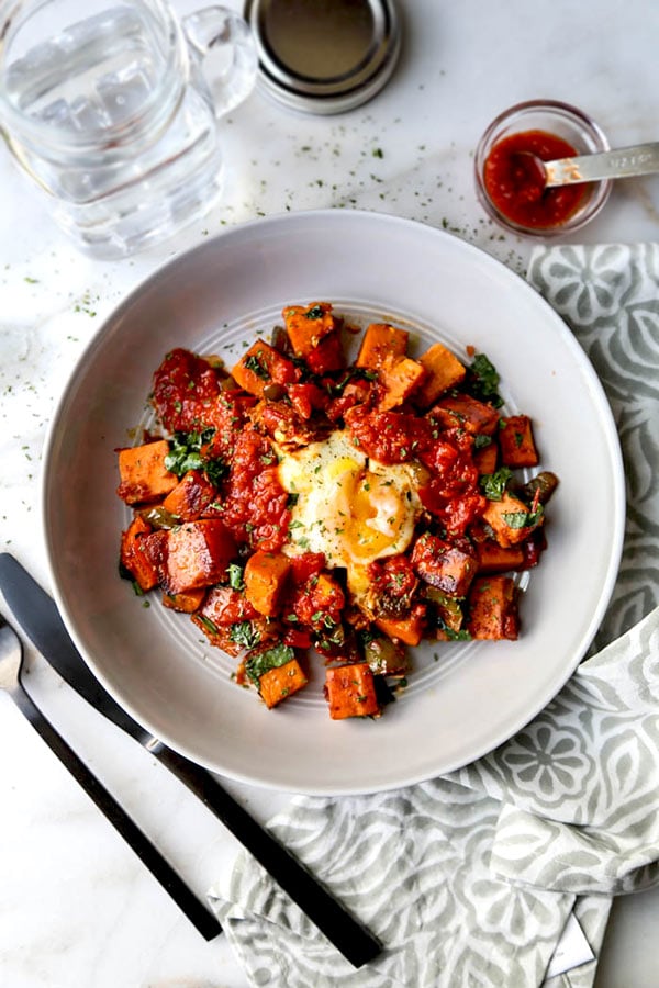 Harissa Sweet Potato Hash - Turn brunch into a healthy and spicy affair with this delicious Harissa Sweet Potato Hash Recipe. Sweet potato breakfast casserole, easy sweet potato recipe, brunch recipe ideas, healthy egg breakfast, gluten free breakfast recipe | pickledplum.com