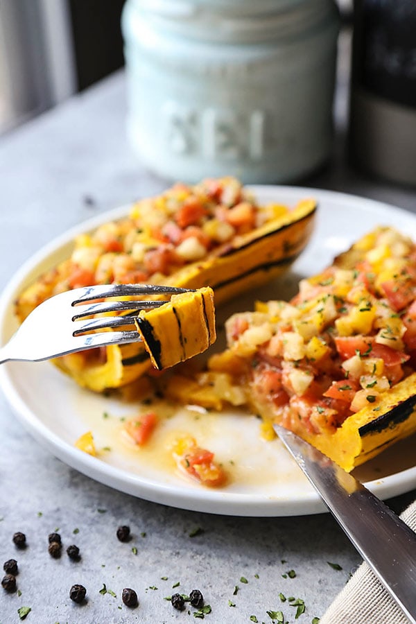 Roasted Delicata Squash With Miso Salsa - The combination of sweet delicata squash, savory miso and salsa-like stuffing puts this healthy comfort food in its own category. winter squash recipes, roasted squash dinner, healthy squash recipes, vegan, vegetarian, gluten free | pickledplum.com