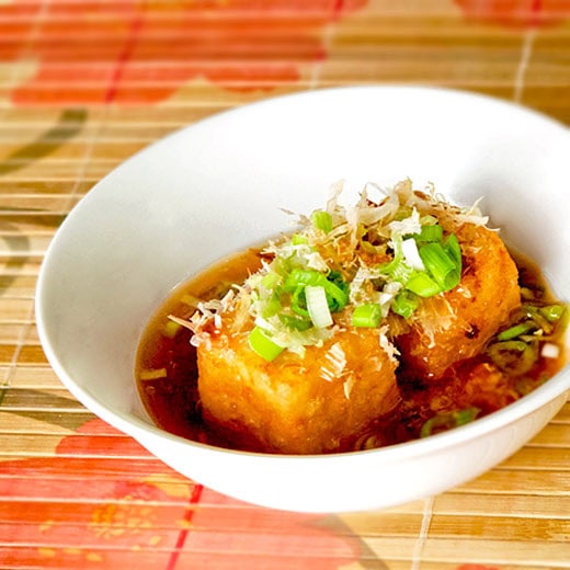 Agedashi tofu, my favorite Japanese tofu recipe! Deep-fried tofu served in a warm tsuyu broth. 