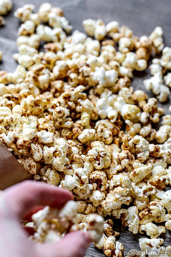 Homemade Sweet and Salty Masala Popcorn - This simple to make Homemade Sweet And Salty Masala Popcorn is the perfect flavor-forward snack for your epic Super Bowl party or a cozy movie night. homemade popcorn recipes, popcorn seasoning, popcorn bar, healthy low fat snack, weight loss, diet recipes | pickledplum.com