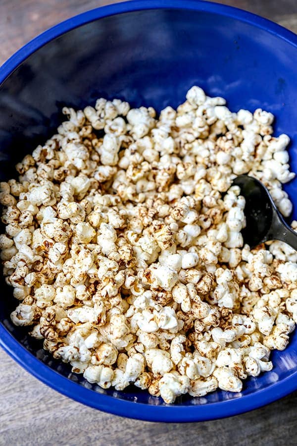 Homemade Sweet and Salty Masala Popcorn - This simple to make Homemade Sweet And Salty Masala Popcorn is the perfect flavor-forward snack for your epic Super Bowl party or a cozy movie night. homemade popcorn recipes, popcorn seasoning, popcorn bar, healthy low fat snack, weight loss, diet recipes | pickledplum.com