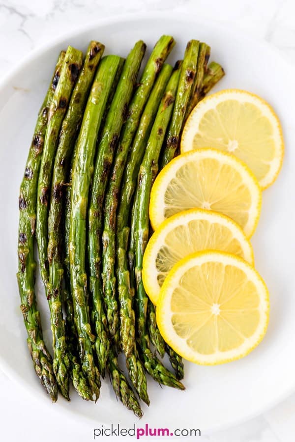 How To Cook Asparagus - Find out how to cook asparagus in the oven, on the stove, in a pan, skillet, on the grill, steamed, air fryer and in the microwave! Make healthy and easy meal by choosing your favorite cooking method, whether you want soft or crunchy asparagus! #asparagus #howtocook #healthyeating #cookingtips | pickledplum.com