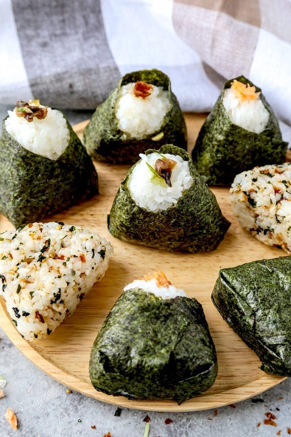 All About Onigiri - おにぎり- (How to Make + 4 Easy Recipes) - Easy fillings for fish lovers and vegans (vegetarians), learn how to make beautiful onigiri. These make a simple and healthy lunch or snack (for kids too). #japanesefood #snacks #healthyrecipes #homemade #rice | pickledplum.com
