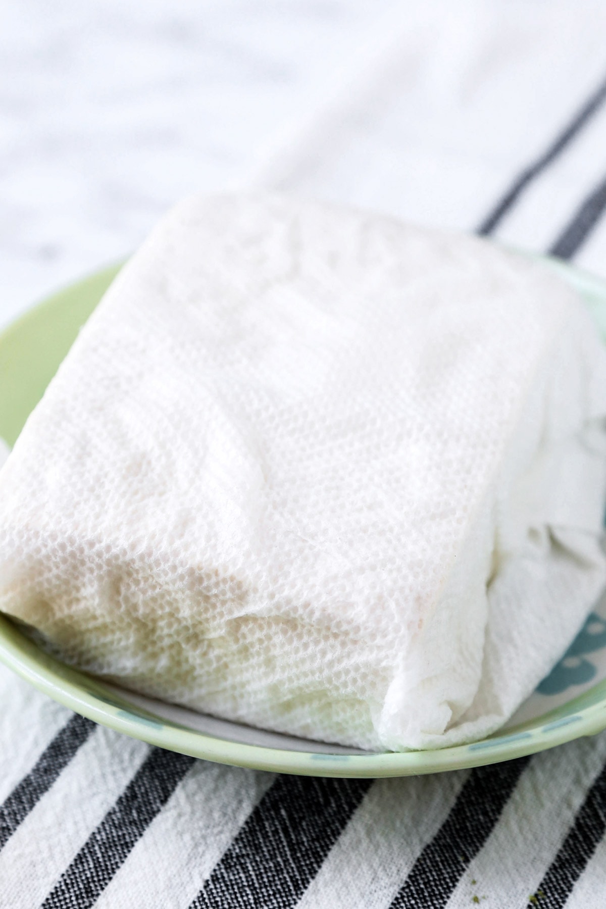 firm tofu wrapped in paper towel