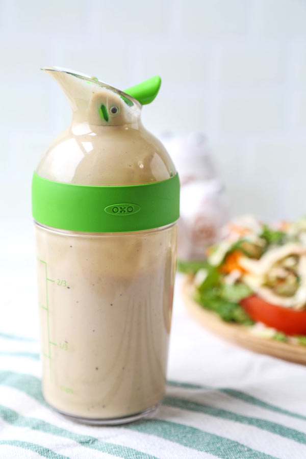 Creamy Tofu Ginger Salad Dressing (Vegan) - This is a quick and easy vegan creamy tofu salad dressing that's gingery, tangy and a little sweet. Ready in just 5 minutes! #veganrecipes #vegetarian #glutenfree #saladdressing | pickledplum.com