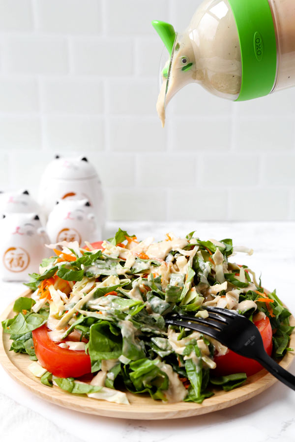 Creamy Tofu Ginger Salad Dressing (Vegan) - This is a quick and easy vegan creamy tofu salad dressing that's gingery, tangy and a little sweet. Ready in just 5 minutes! #veganrecipes #vegetarian #glutenfree #saladdressing | pickledplum.com