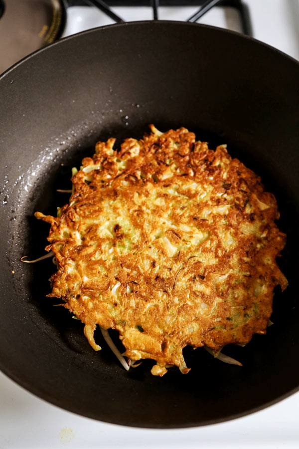 Okonomiyaki fryin in a pan