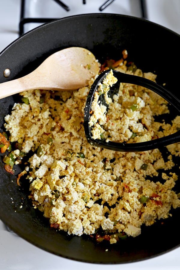 Mexican Style Tofu Scramble - An easy and delicious vegan breakfast recipe you can serve for dinner too! This Mexican Style Tofu Scramble Recipe could easily pass for a hearty plate of Huevos Rancheros! No turmeric used, we are going for Tex Mex flavors! #tofurecipes #tofuscramble #veganrecipes #veganbreakfast #meatlessmonday | pickledplum.com