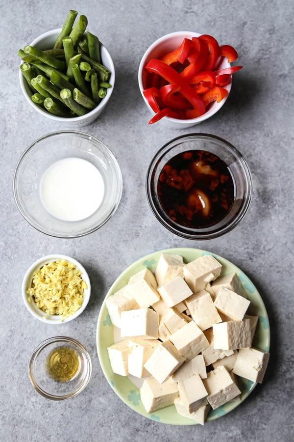 Asian Tofu Stir Fry Recipe - Easy, healthy vegetarian tofu stir fry with gooey sauce that's a little spicy. #tofurecipes #vegetarian #healthyrecipe #stirfry | pickledplum.com