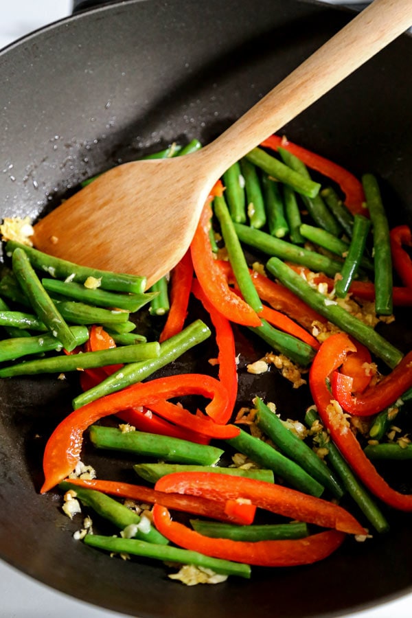 Asian Tofu Stir Fry Recipe - Easy, healthy vegetarian tofu stir fry with gooey sauce that's a little spicy. #tofurecipes #vegetarian #healthyrecipe #stirfry | pickledplum.com