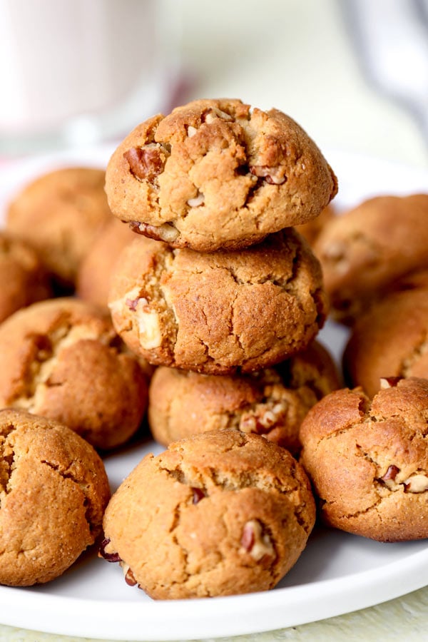 Vegan Peanut Butter Cookies - This is an easy recipe for peanut butter cookies that are 100% plant based. Crispy, sweet and nutty cookies made with chickpea and almond flour and packed with pecans! #cookies #cookierecipe #desserts #thanksgivingcookies #peanutbutter | pickledplum.com