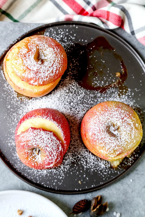 French Stuffed Baked Apples - A delicious dessert that hails from the French country side, these stuffed baked apples are sweet, tender and stuffed with nutritious ingredients. They are scrumptious! #dessertrecipes #christmasrecipes #vegetariandessert #healthydessert | pickledplum.com